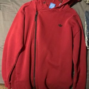 Adidas red coat, fits like trench coat.
